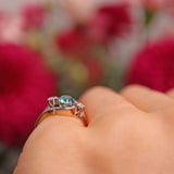 Ellibelle Jewellery 1950s Blue Zircon & Diamond Three-Stone Bypass Ring