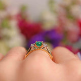 Ellibelle Jewellery Emerald & Diamond 18ct Gold Oval Three-Stone Engagement Ring (0.83ct)