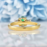 Ellibelle Jewellery Emerald & Diamond 18ct Gold Oval Three-Stone Engagement Ring (0.83ct)