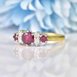 Ellibelle Jewellery Vintage 1970s Ruby & Diamond 18ct Gold Seven-Stone Ring
