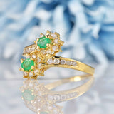 Ellibelle Jewellery Vintage 1992 Emerald & Diamond 18ct Gold Crossover Cluster Ring