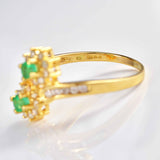 Ellibelle Jewellery Vintage 1992 Emerald & Diamond 18ct Gold Crossover Cluster Ring