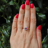 Ruby & Diamond 18ct Gold Halo Cluster Ring