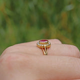 Ellibelle Jewellery VINTAGE RUBY & DIAMOND 18CT GOLD OVAL HALO RING