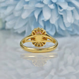 Ellibelle Jewellery VINTAGE RUBY & DIAMOND 18CT GOLD OVAL HALO RING