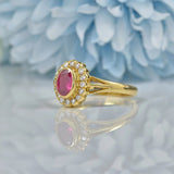 Ellibelle Jewellery VINTAGE RUBY & DIAMOND 18CT GOLD OVAL HALO RING