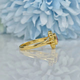Ellibelle Jewellery VINTAGE RUBY & DIAMOND 18CT GOLD OVAL HALO RING