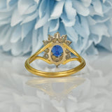 Ellibelle Jewellery VINTAGE SAPPHIRE & DIAMOND 18CT GOLD HALO RING