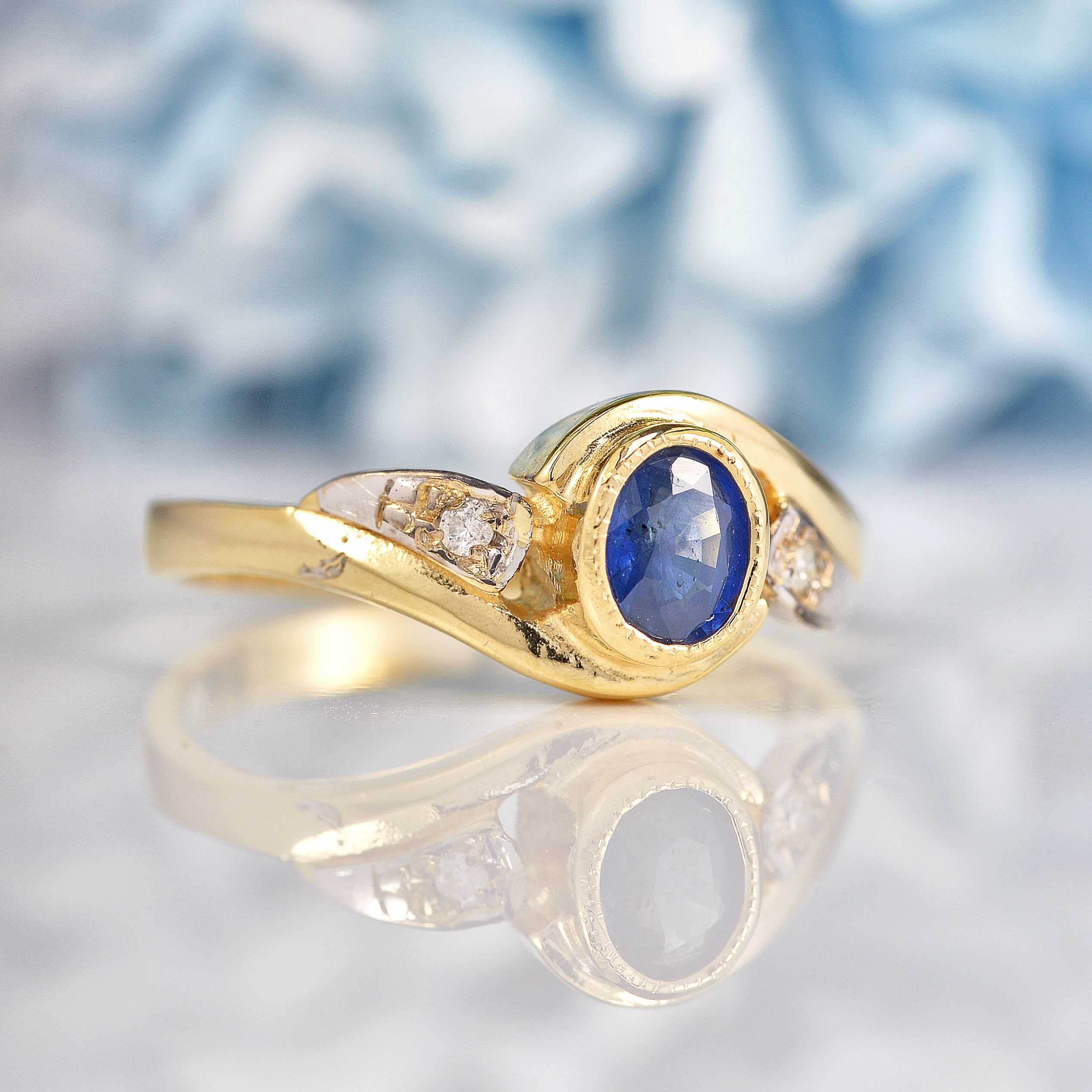 Ellibelle Jewellery Blue Sapphire & Diamond 9ct Gold Crossover Engagement Ring