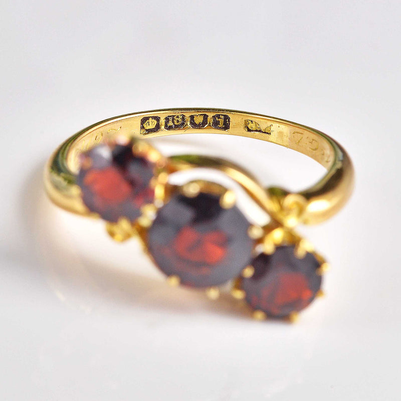 Ellibelle Jewellery Edwardian Almandine Garnet 18ct Gold Three-Stone Bypass Ring