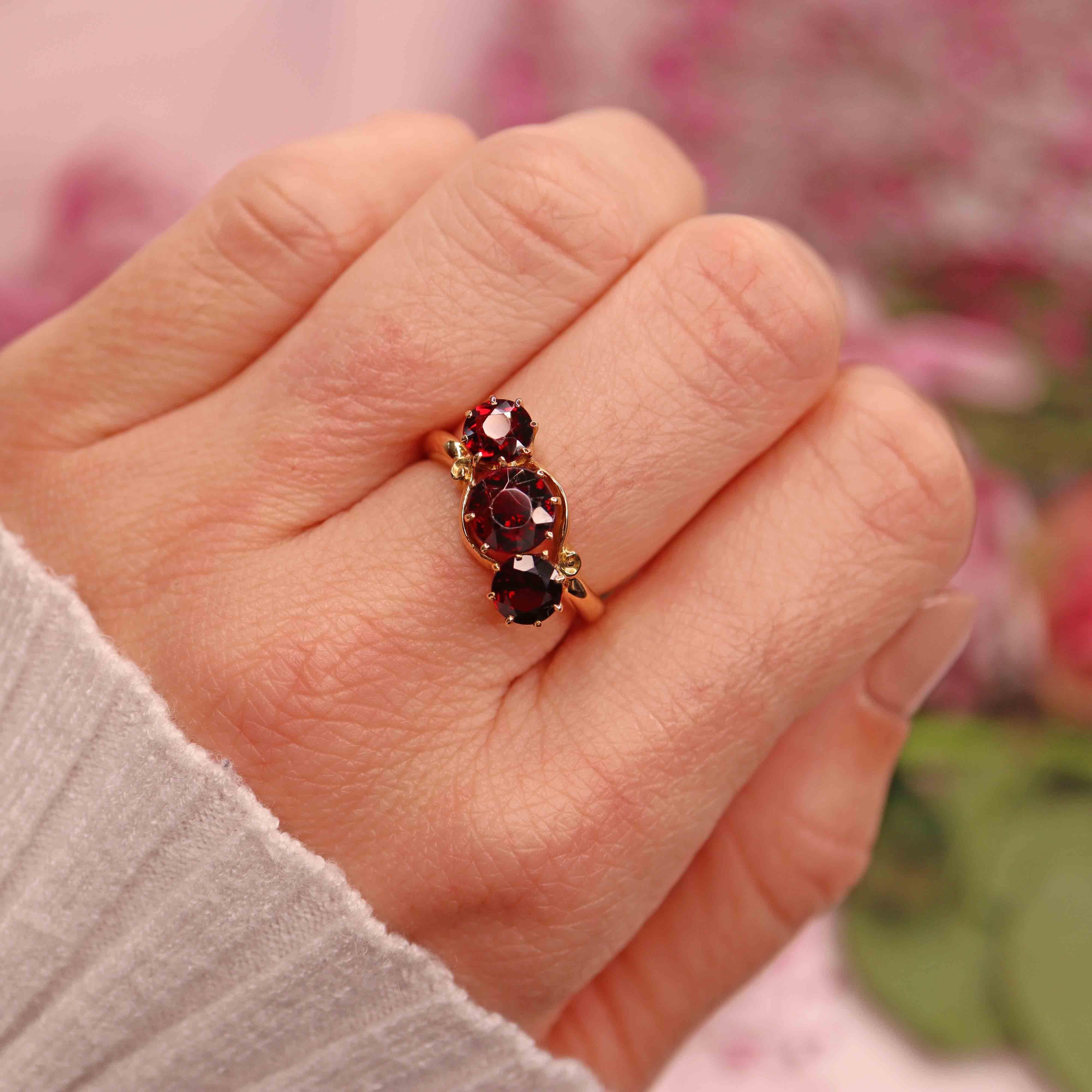 Ellibelle Jewellery Edwardian Almandine Garnet 18ct Gold Three-Stone Bypass Ring