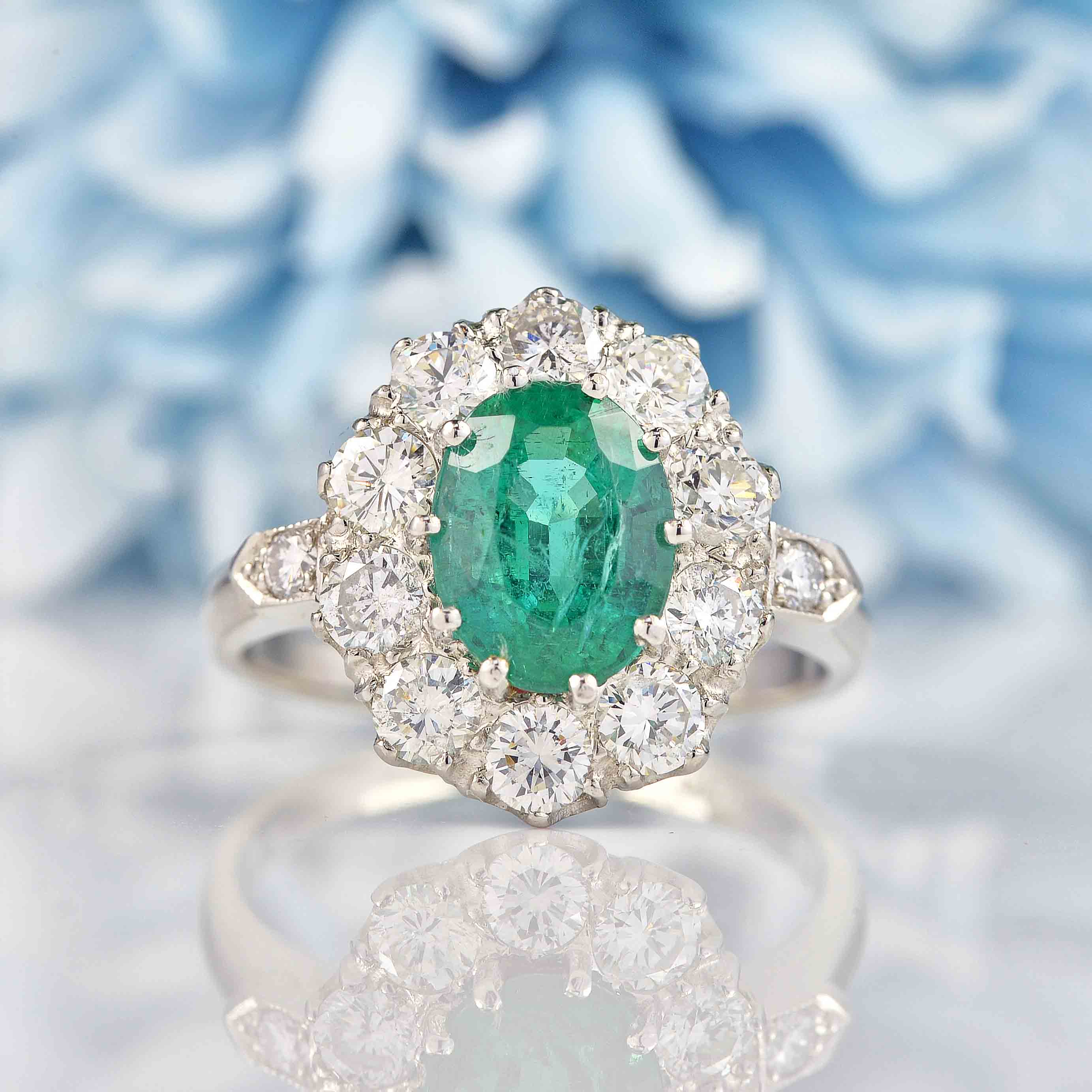 Ellibelle Jewellery Emerald & Diamond Platinum Cluster Engagement Ring