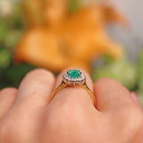 Ellibelle Jewellery Millennium Emerald & Diamond 18ct Gold Oval Cluster Ring (0.80cts)
