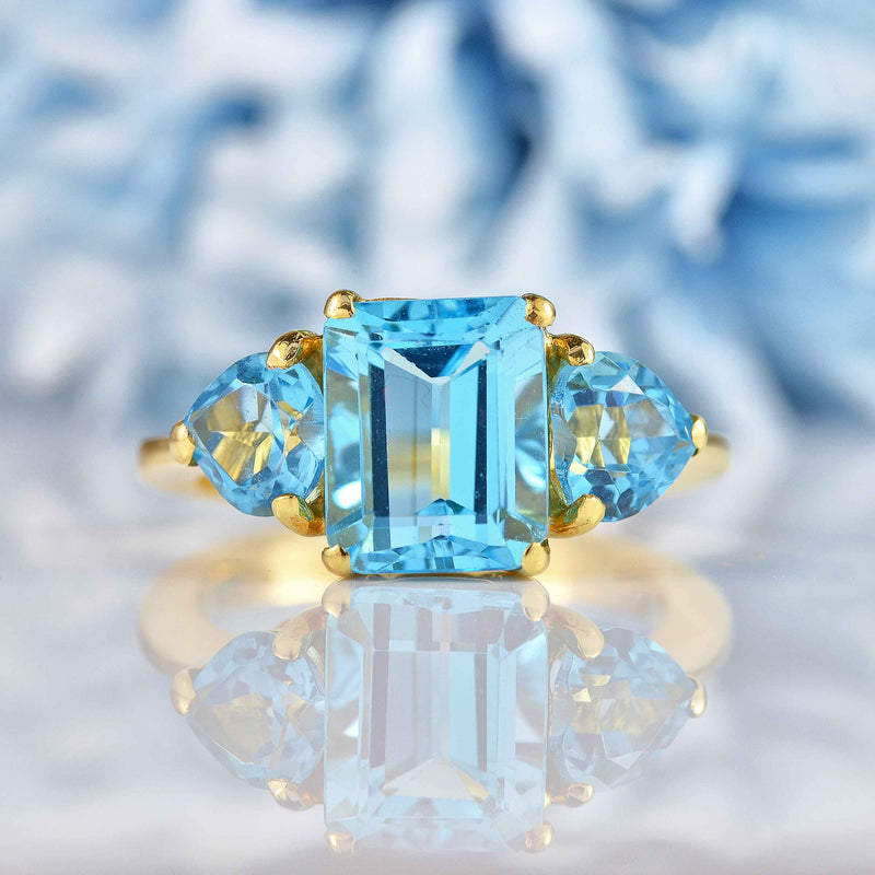 Ellibelle Jewellery Swiss Blue Topaz 18ct Gold Three-Stone Ring