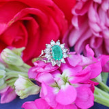 Ellibelle Jewellery Vintage 1973 Emerald & Diamond 18ct Gold Oval Cluster Ring (0.60cts)