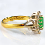 Ellibelle Jewellery Vintage 1973 Emerald & Diamond 18ct Gold Oval Cluster Ring (0.60cts)
