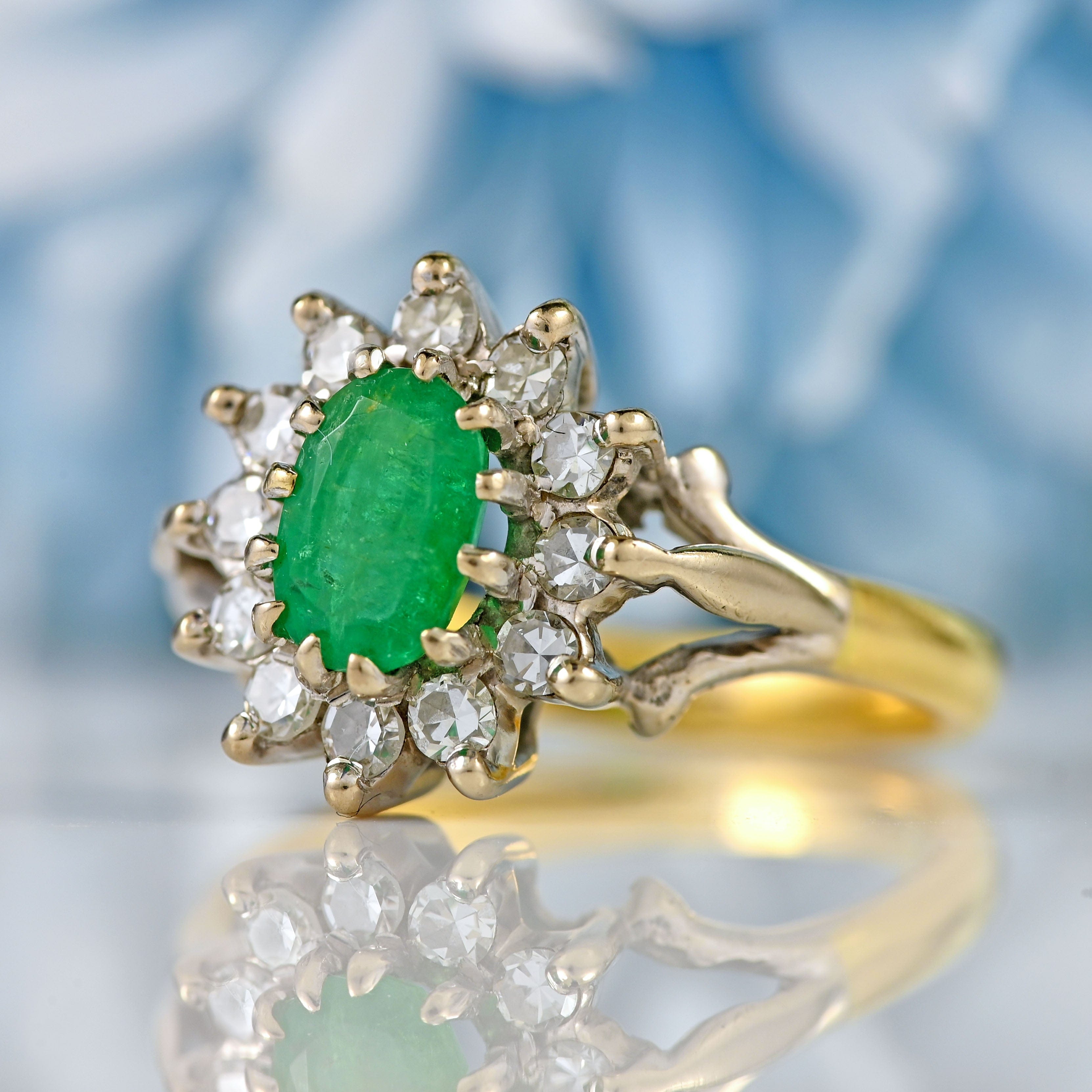 Ellibelle Jewellery Vintage 1973 Emerald & Diamond 18ct Gold Oval Cluster Ring (0.60cts)