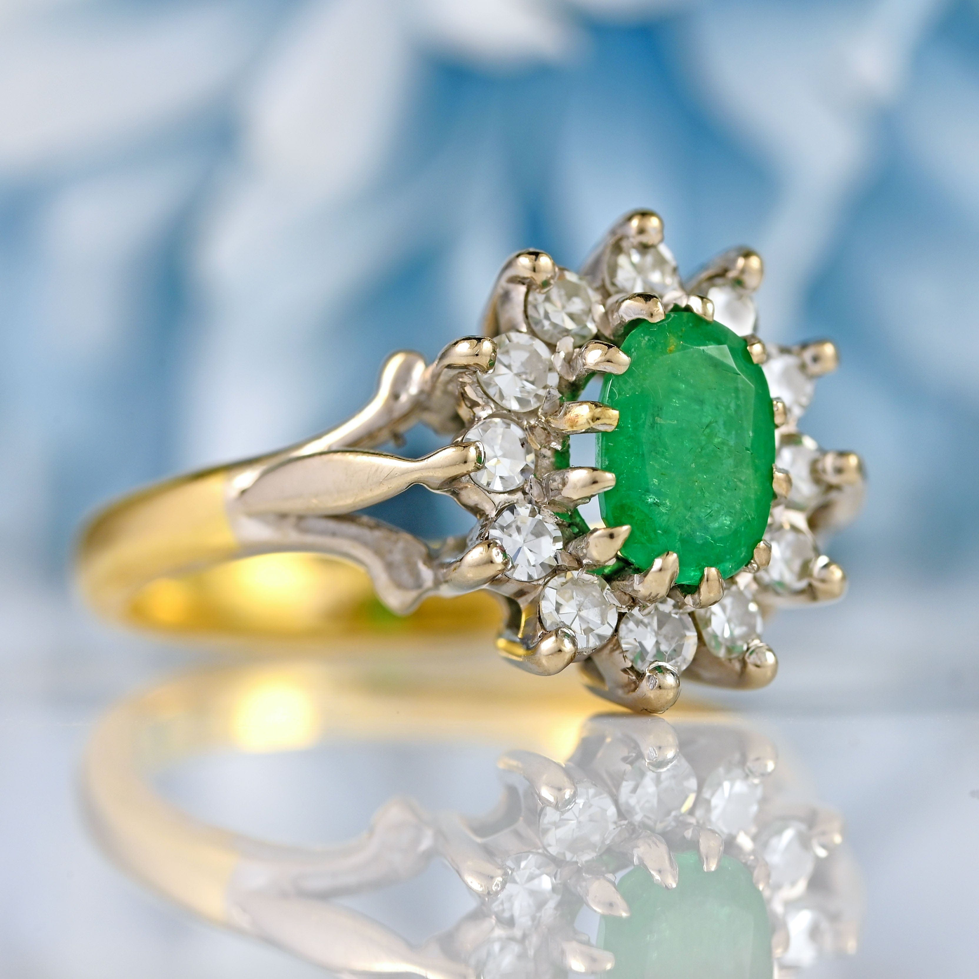 Ellibelle Jewellery Vintage 1973 Emerald & Diamond 18ct Gold Oval Cluster Ring (0.60cts)
