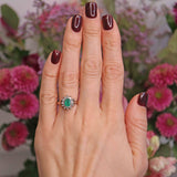 Ellibelle Jewellery Vintage 1973 Emerald & Diamond 18ct Gold Oval Cluster Ring (0.60cts)