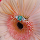 Ellibelle Jewellery Vintage Emerald & Diamond White Gold Three-Stone Engagement Ring (0.88cts)