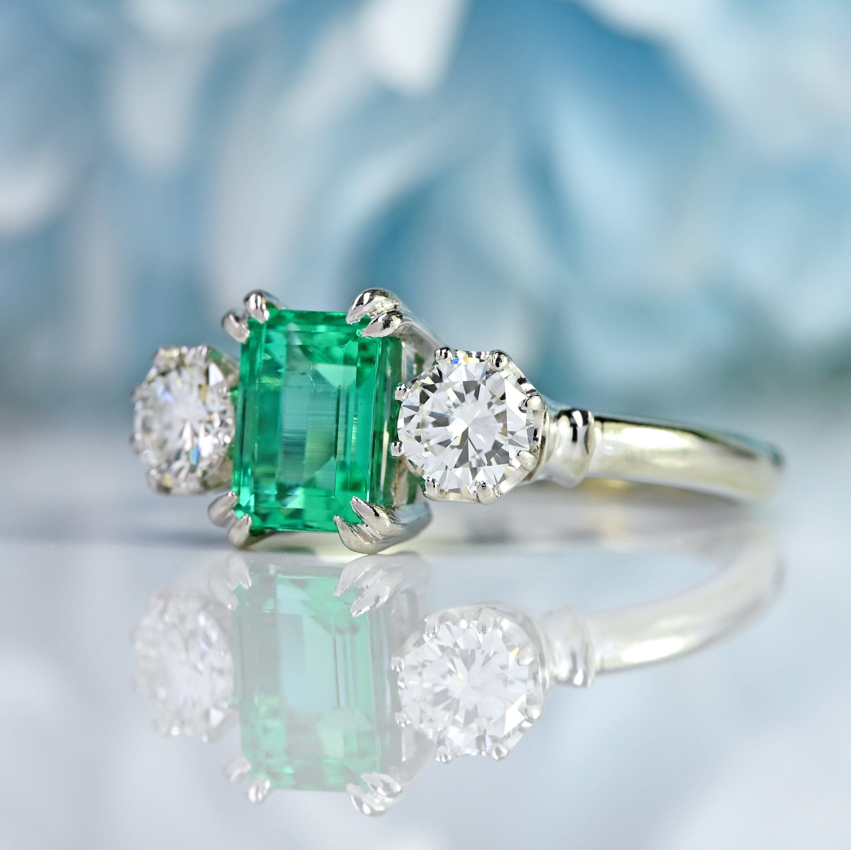 Ellibelle Jewellery Vintage Emerald & Diamond White Gold Three-Stone Engagement Ring (0.88cts)