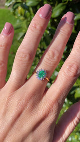Millennium Emerald & Diamond 18ct Gold Oval Cluster Ring (0.80cts)