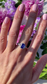 Emerald-Cut Tanzanite & Diamond Platinum Halo Ring