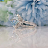 AQUAMARINE & DIAMOND 14CT WHITE GOLD HALO RING