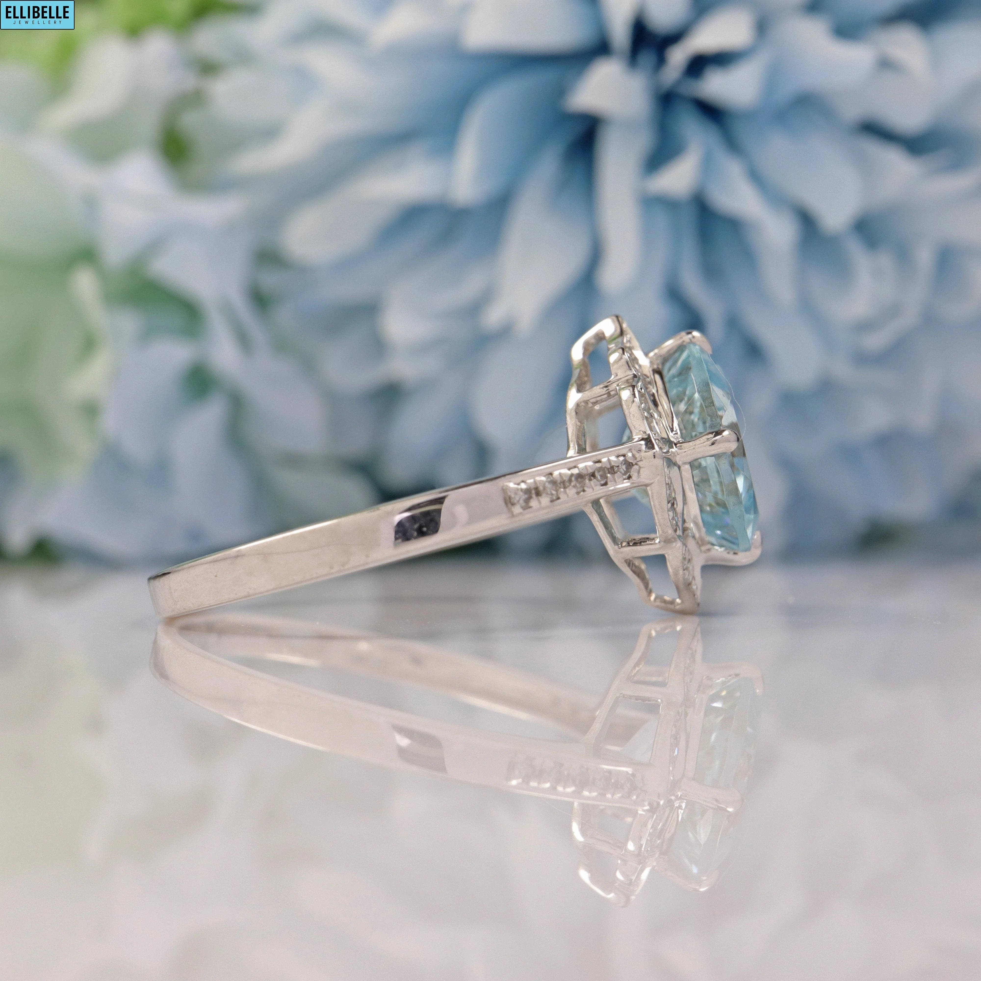 AQUAMARINE & DIAMOND 14CT WHITE GOLD HALO RING