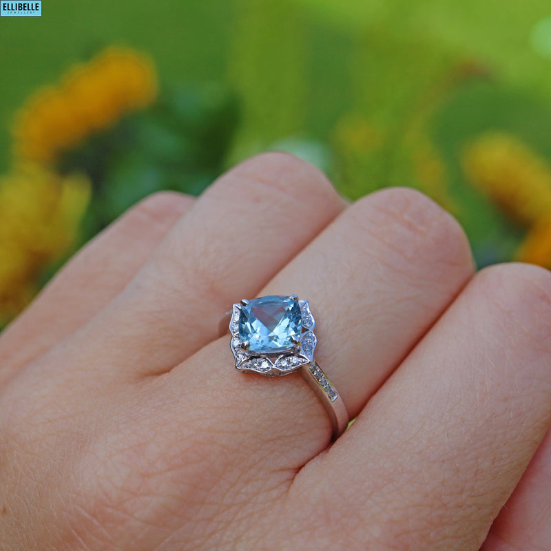 AQUAMARINE & DIAMOND 14CT WHITE GOLD HALO RING