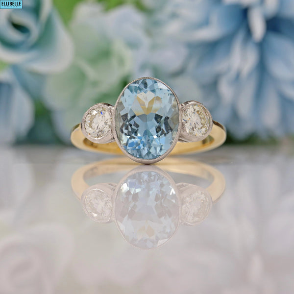 ART DECO AQUAMARINE & DIAMOND 18CT GOLD THREE-STONE RING