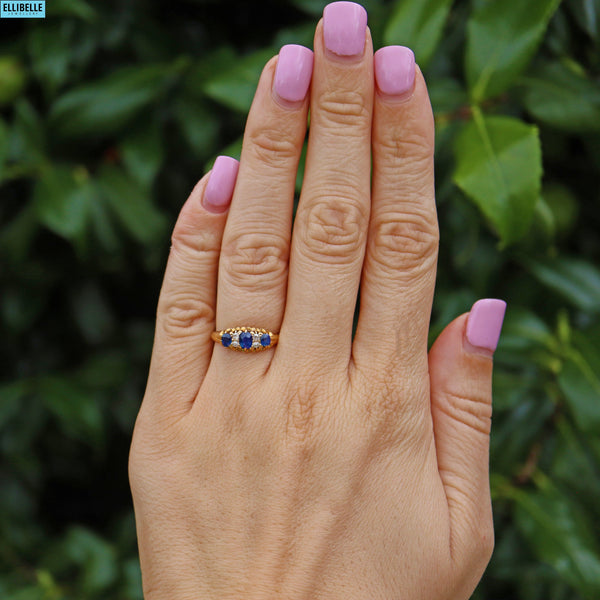 EDWARDIAN SAPPHIRE & DIAMOND 18CT GOLD THREE-STONE RING