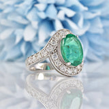 Ellibelle Jewellery Natural Emerald & Diamond White Gold Crossover Engagement Ring