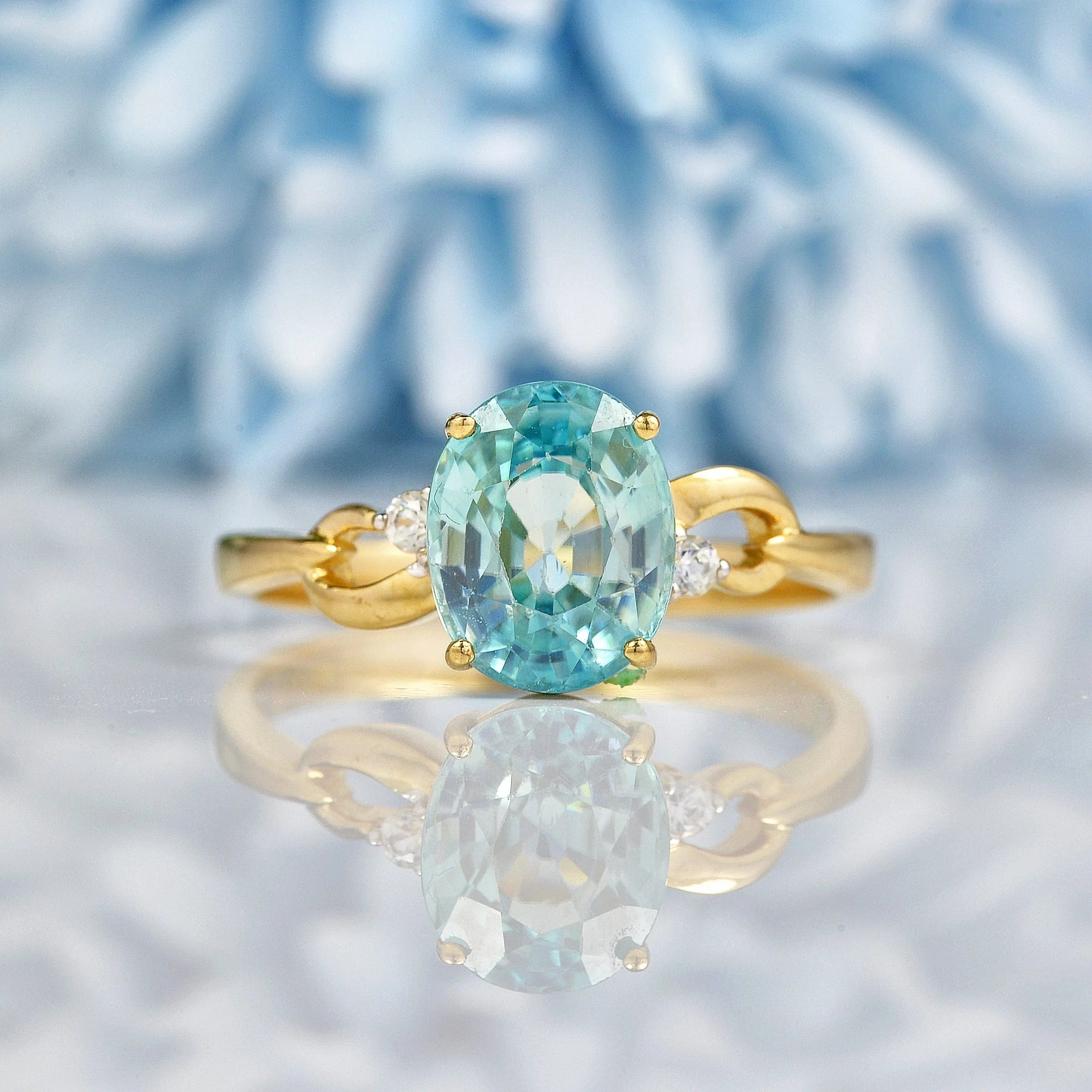 Ellibelle Jewellery Oval Cut Blue Zircon 9ct Yellow Gold Solitaire Ring