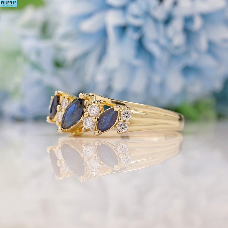 SAPPHIRE & DIAMOND 9CT GOLD MARQUISE BAND RING
