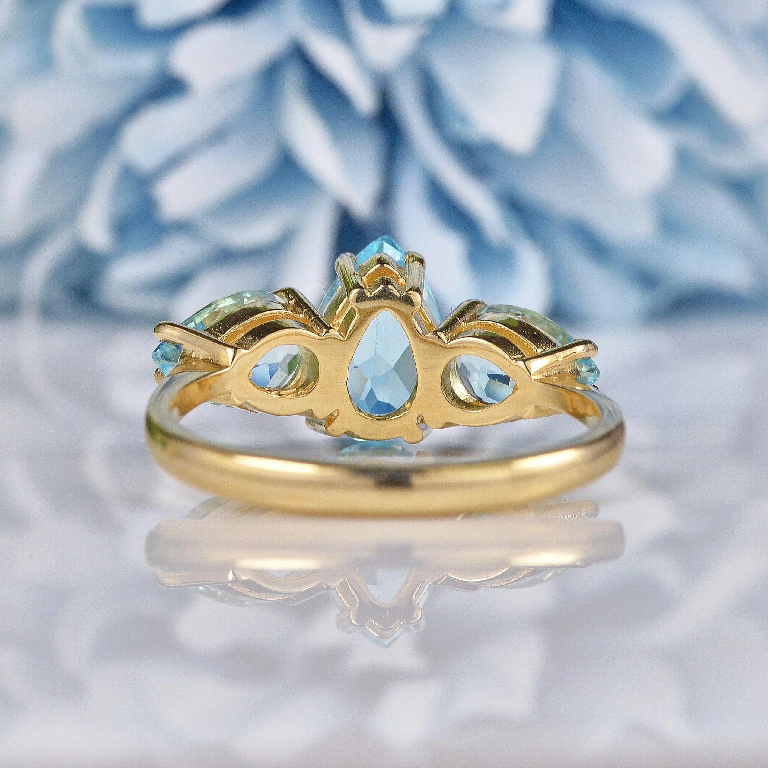 Ellibelle Jewellery Swiss Blue Topaz 9ct Gold Three Stone Ring