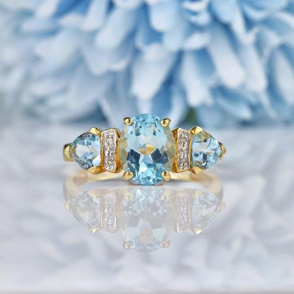 Ellibelle Jewellery Swiss Blue Topaz & Diamond 9ct Gold Trilogy Ring