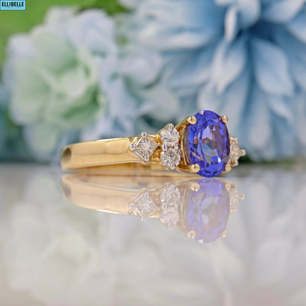 TANZANITE & DIAMOND 14CT GOLD RING