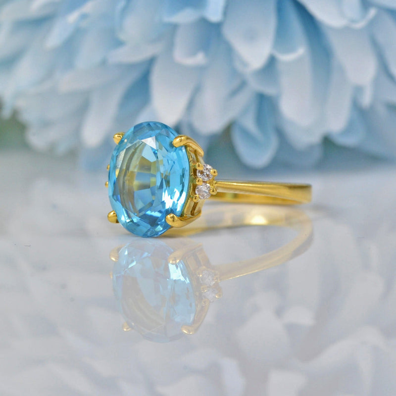 TOPAZ & DIAMOND 18CT GOLD SOLITAIRE RING