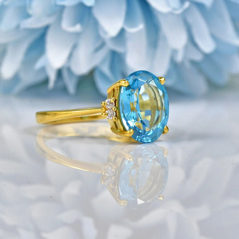 TOPAZ & DIAMOND 18CT GOLD SOLITAIRE RING