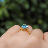 TOPAZ & DIAMOND 18CT GOLD SOLITAIRE RING