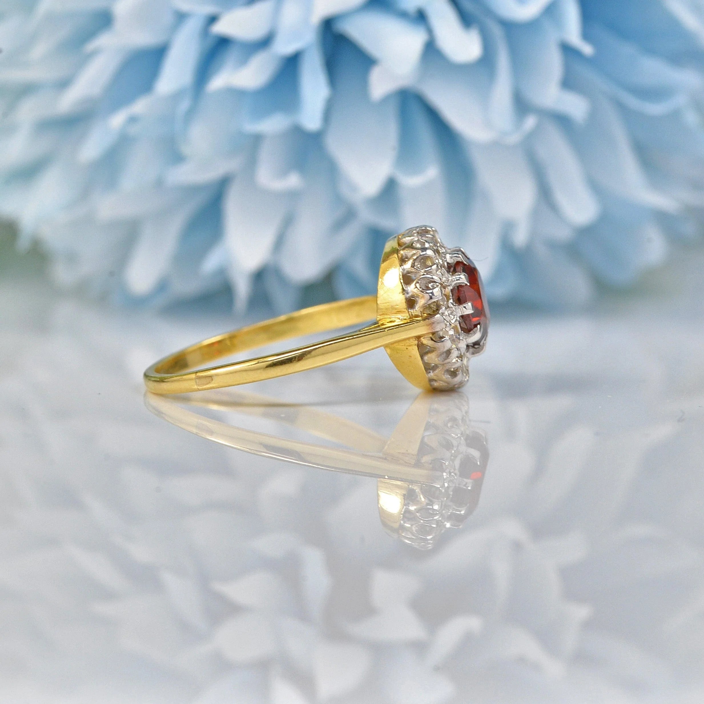 Ellibelle Jewellery VINTAGE 1960S GARNET & DIAMOND 18CT GOLD HALO RING