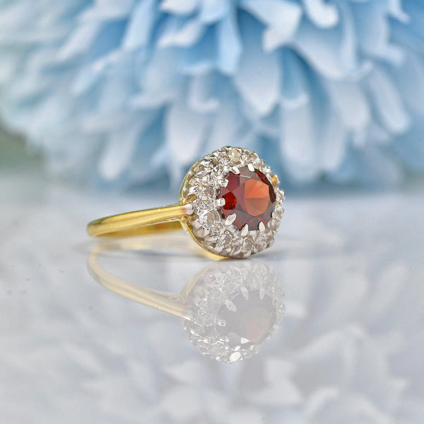 Ellibelle Jewellery VINTAGE 1960S GARNET & DIAMOND 18CT GOLD HALO RING