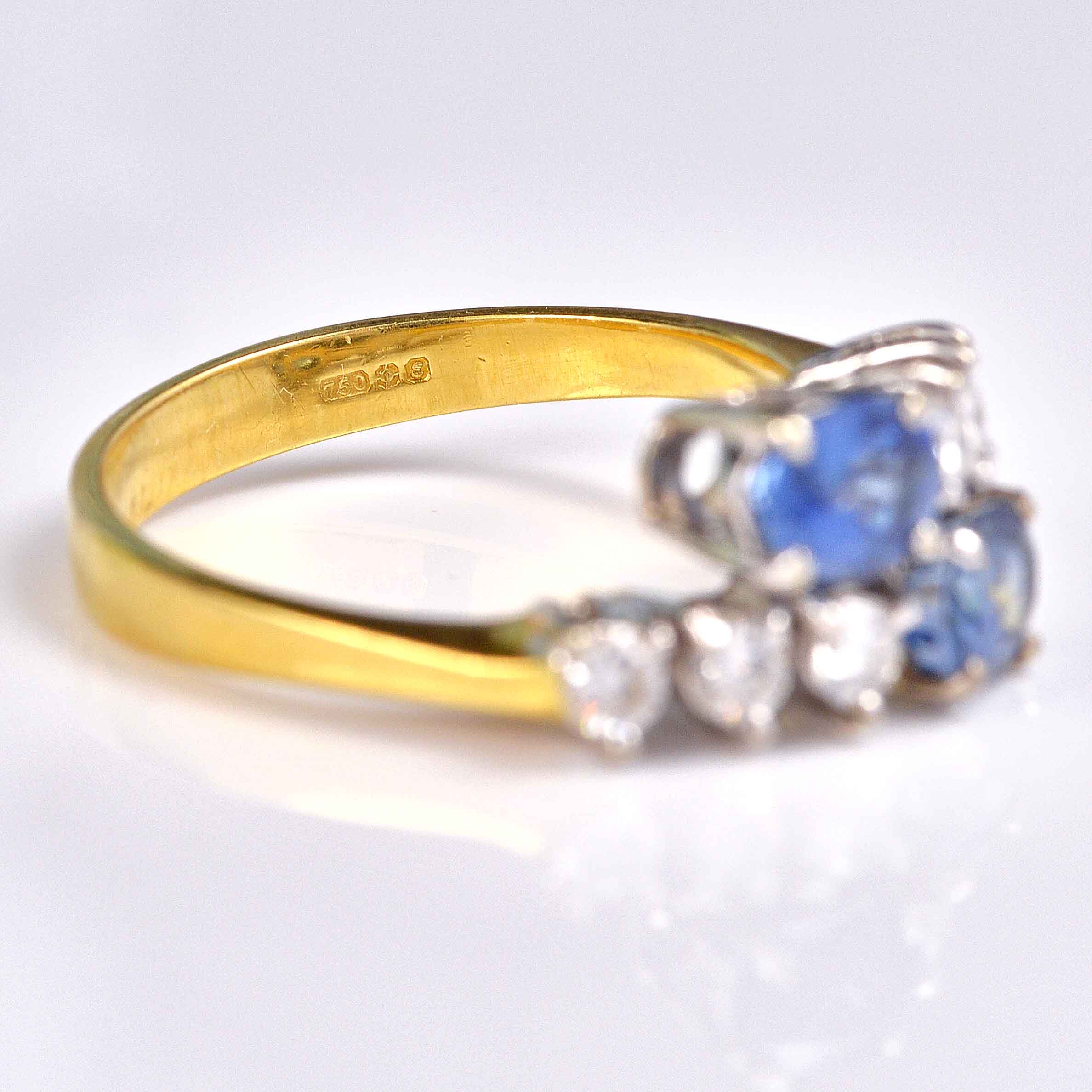 Ellibelle Jewellery Vintage 1979 Ceylon Sapphire & Diamond 18ct Gold Bypass Ring