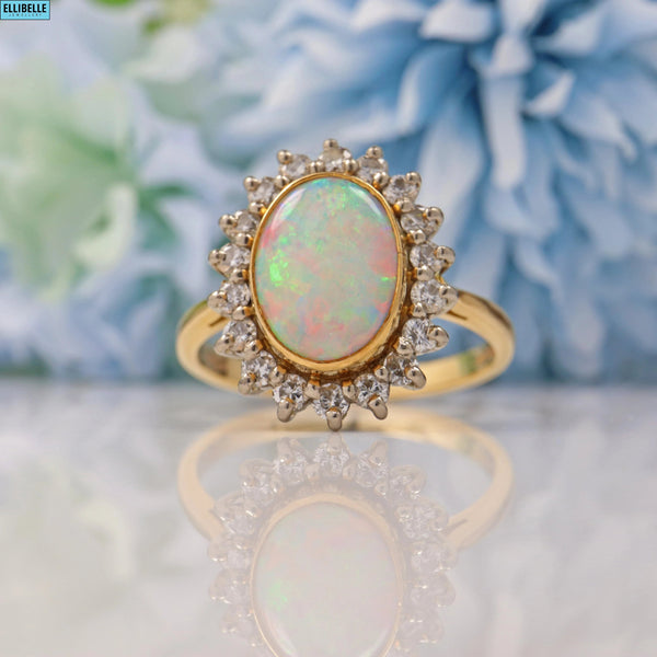 VINTAGE 1980S OPAL & DIAMOND 18CT GOLD HALO RING