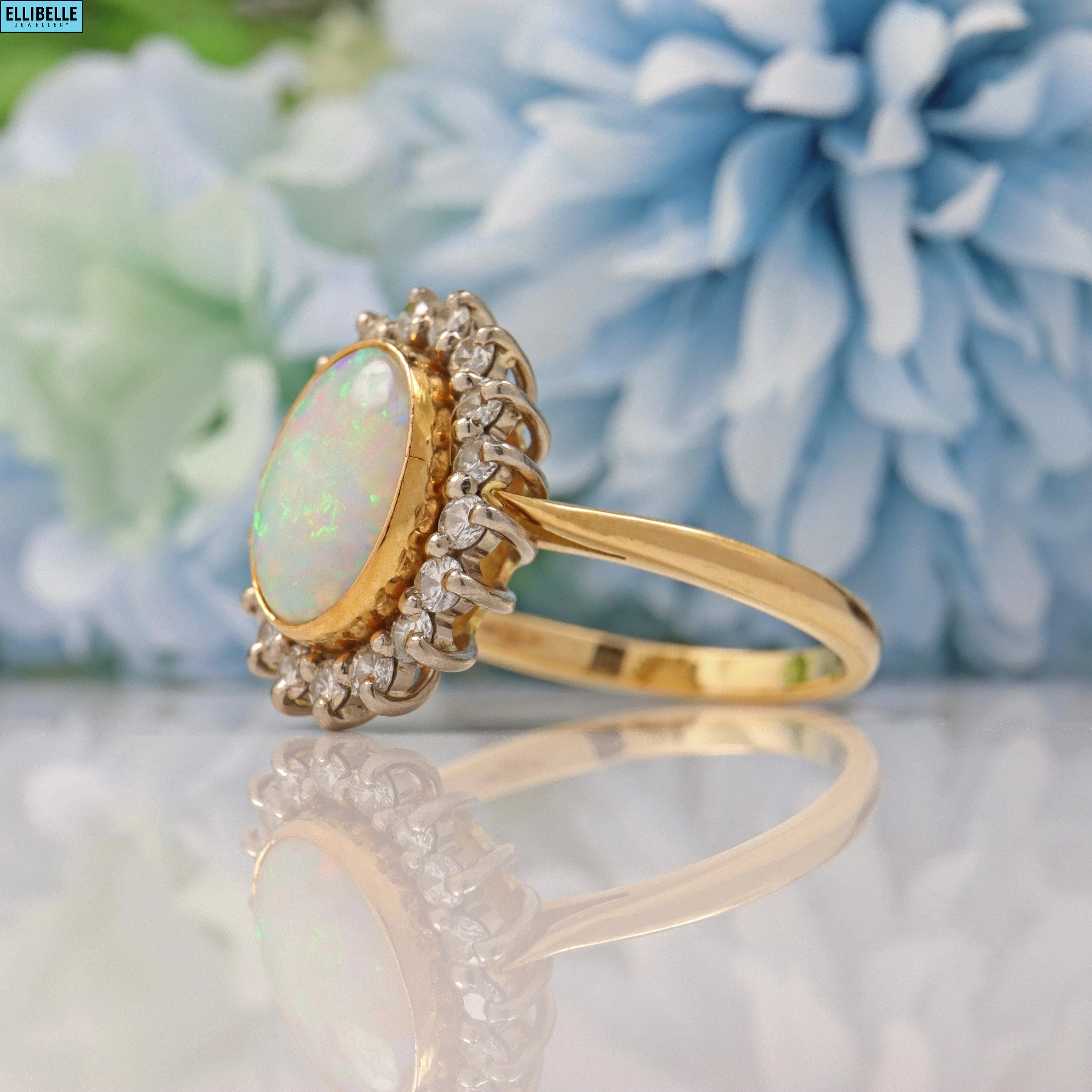 VINTAGE 1980S OPAL & DIAMOND 18CT GOLD HALO RING
