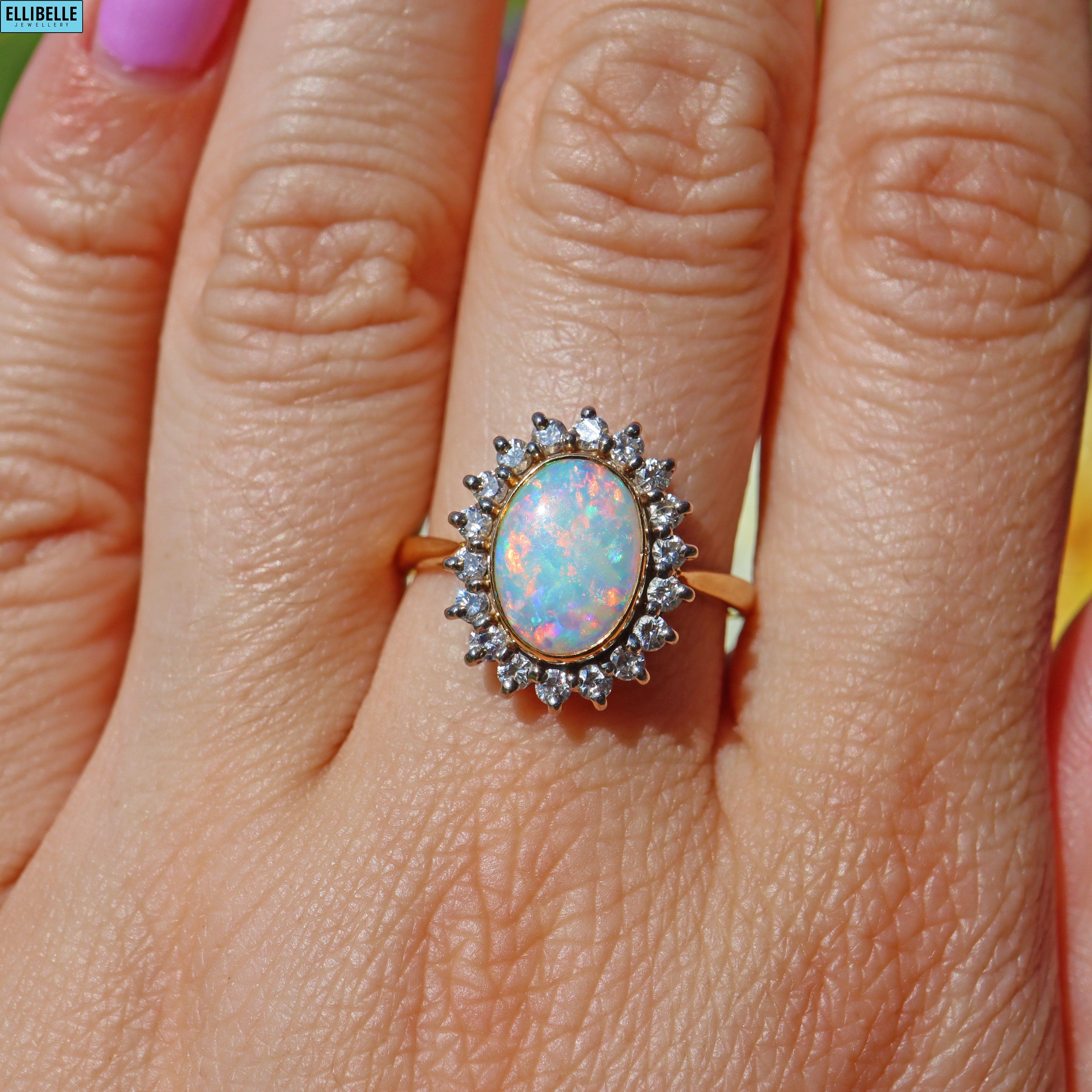 VINTAGE 1980S OPAL & DIAMOND 18CT GOLD HALO RING