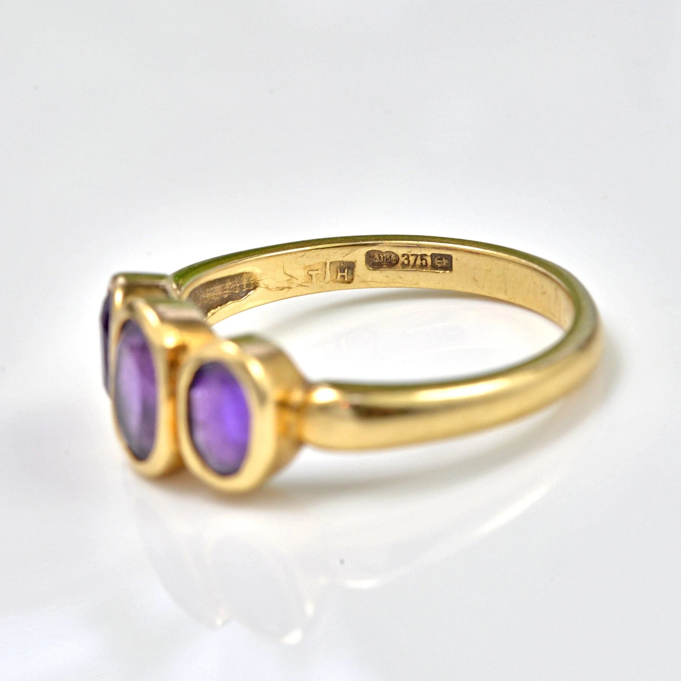 Ellibelle Jewellery VINTAGE AMETHYST 9CT GOLD THREE-STONE RING