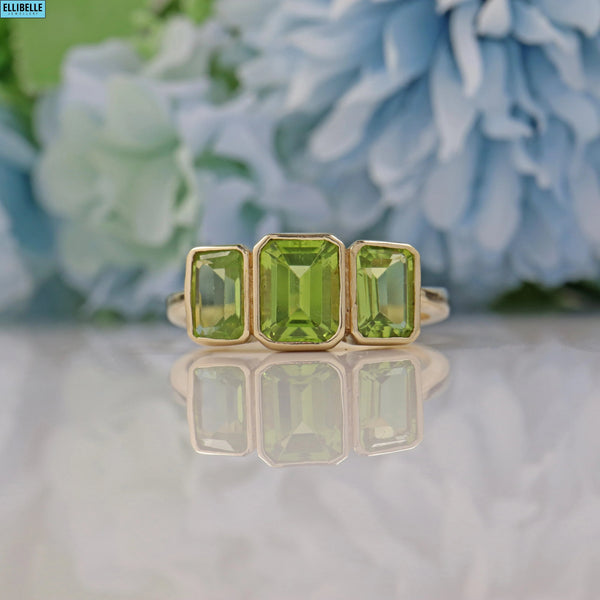 Ellibelle Jewellery VINTAGE EMERALD-CUT PERIDOT 9CT GOLD TRILOGY RING