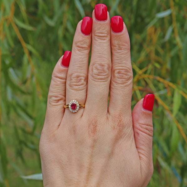 Ellibelle Jewellery VINTAGE RUBY & DIAMOND 18CT GOLD OVAL HALO RING
